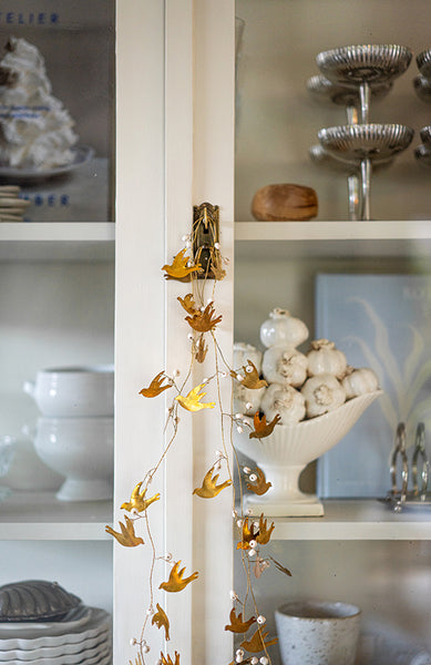 Fågelgirlang i mässing